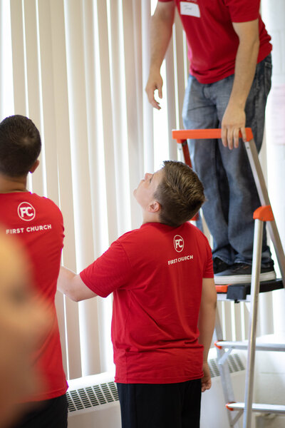 Teenagers serving their community at a non-denominational church in Fayetteville, NC.