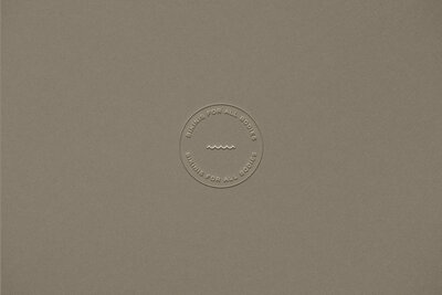 Modern minimalist logo design for a hair salon featuring sleek typography and neutral tones.