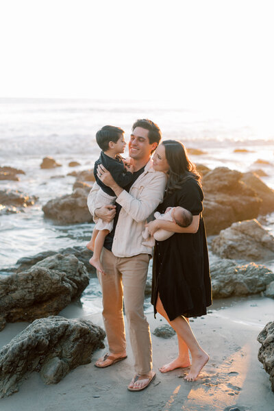 Malibu photographer capturing natural family portraits on the beach at El Matador, featuring soft light and relaxed, coastal tones.