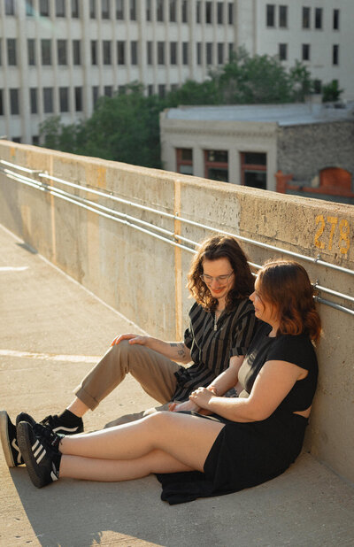couple enjoying golden hour on the roof top 