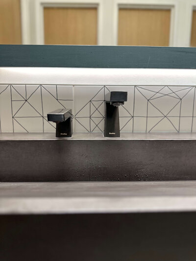 Slate ramp sink in the MN Opera public restroom