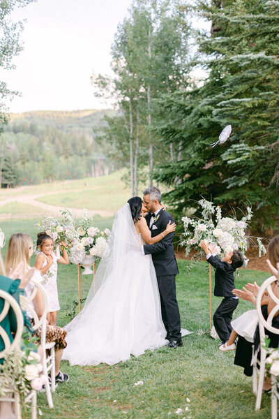 Colorado couple kissing after wedding ceremony