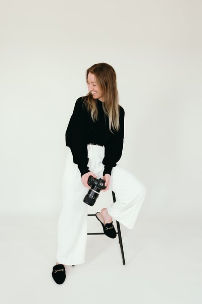wedding photographer branding photos in a studio