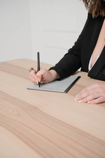ashe writing in journal