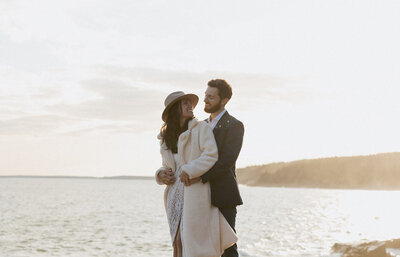 Shenandoah elopement at sunset showing a couple on top of a mountain after getting married. Photography by Rock & Wander Photo Co.