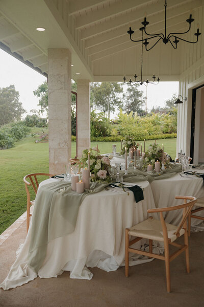Sage, pink, and white tablescape design at Waialua Valley Farm wedding venue on Oahu, Hawaii