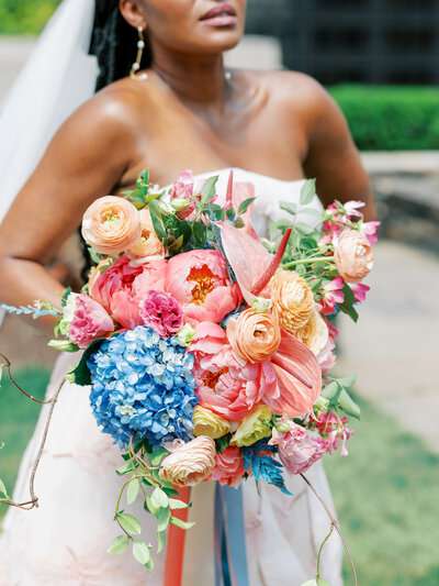 closeup of pink and blue bridal bouquet in New York City