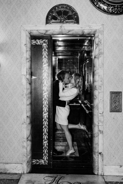 Wedding Photographer Atlanta Georgia | Bride And Groom Kissing On The Elevator At Estate Wedding Reception Venue