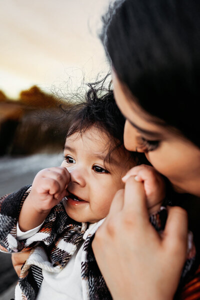 Mother and daughter embracing during Scottsdale family session in neutral tones