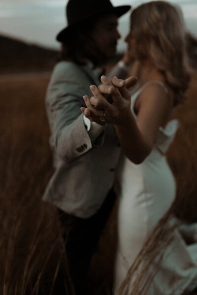 salty lime and co wedding - Central Qld  Bride and Groom holding hands