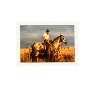 Tj Deal's grandpa rides a horse.
