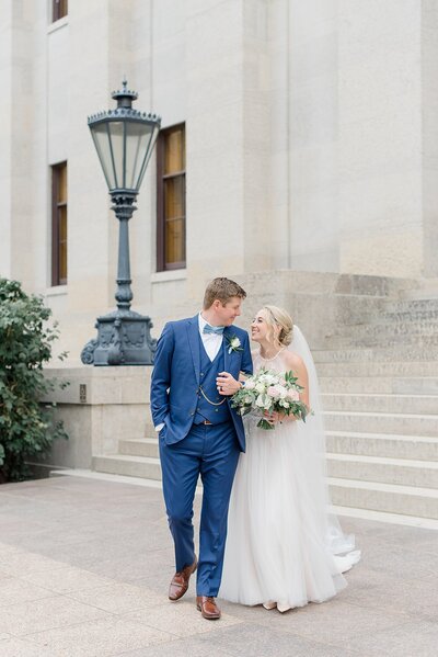 bride and groom walking at ohio state house
