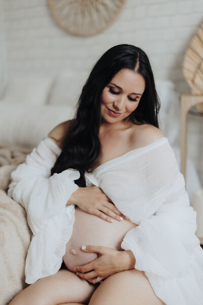 Pregnant mom in white dress