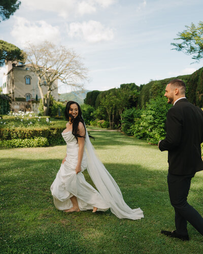 couple dancing under trees