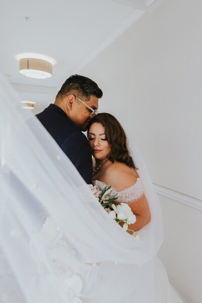 bride and groom esquimo kiss in the mountains of silverthorne colorado