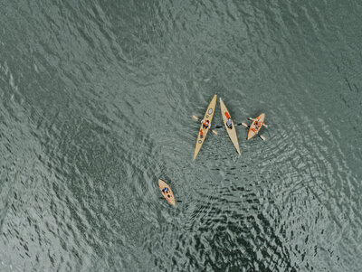 4 kayaks in the water