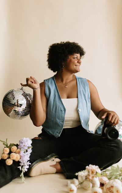 Creative branding photos featuring vibrant florals and disco balls