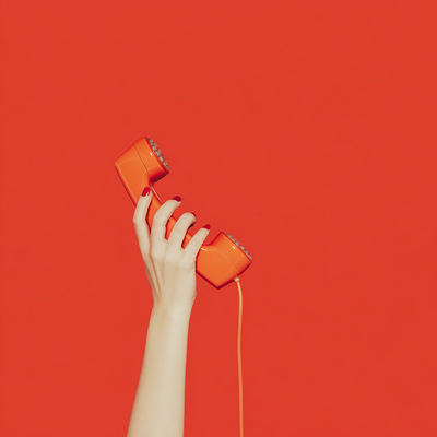 Hand with Red Phone