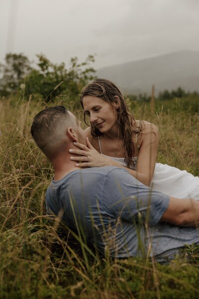 bride and groom embrace after wedding in new hampshire
