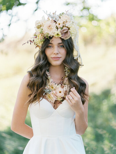 Editorial shoot featuring wearable flower art by Ribbon and Twine Floral