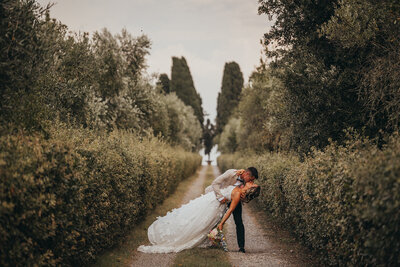 groom kisses his wife