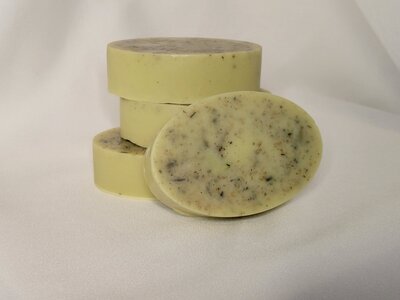 Stacked handmade soap bars containing every ingredient in Berry and balms inventory