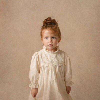 Young girl in heirloom-style portrait session photographed in Michigan