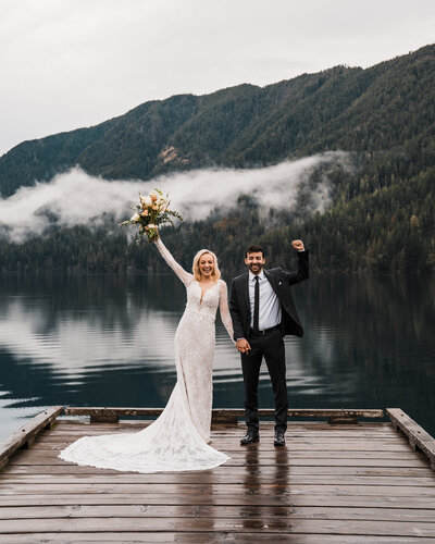 a bride and groom soak in the moment during their elopement in leavenworth photographed by adventure elopement photographer amy galbraith