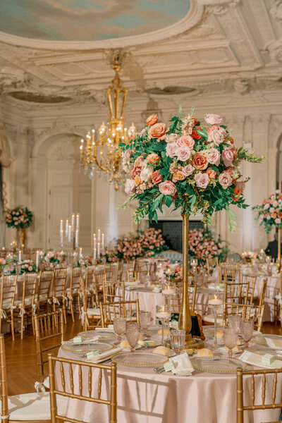 Picture of table at wedding recpetion, pink flowers in middle of table, Rosecliff Mansion Wedding