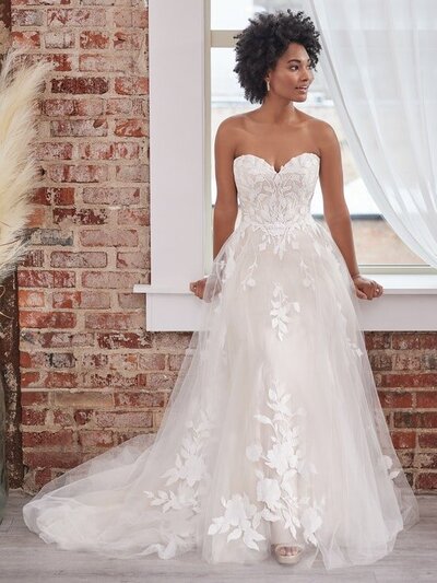 Lace strapless bridal gown with plunging neckline