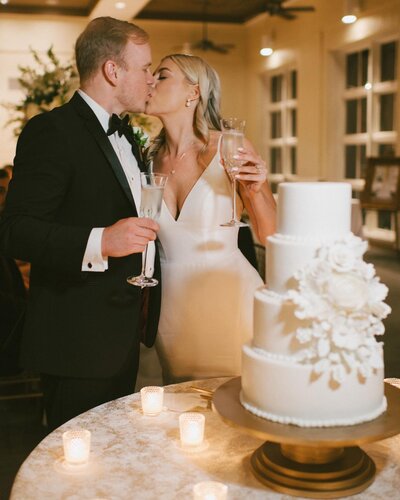 bride and groom kiss