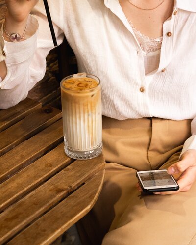 person drinking a latte