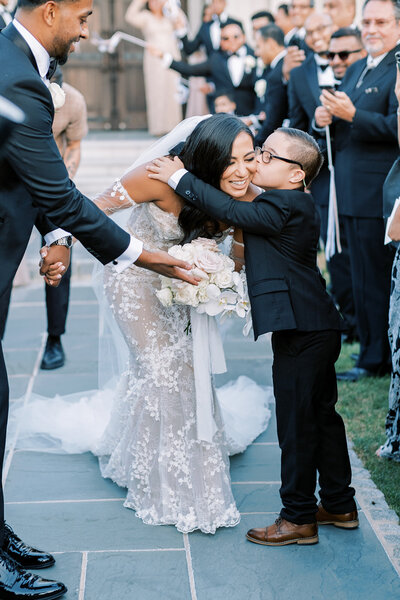 Fashionable and stylish black tie spring wedding with white roses and orchids, Berta wedding gown, and YSL bridal shoes at an Estate with French-inspired architecture and ambiance | Park Chateau Estate and Gardens | East Brunswick NJ | Denise Marie Photography | Editorial Wedding Photographer based in Philadelphia PA