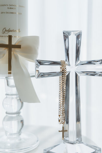 Family heirloom cross featured in a christening session in Perth
