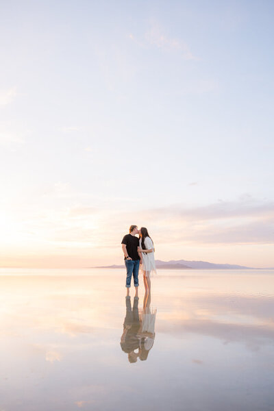 couple with water in background