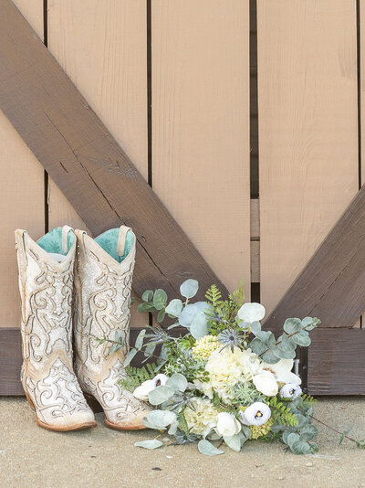 brides boots and flowers