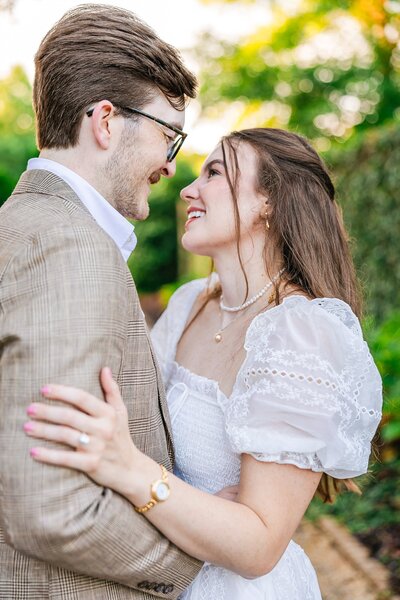 Engaged couple posing together at Auburn session