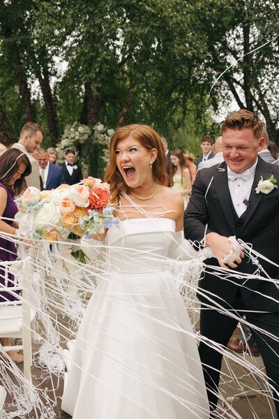 Happy bride and groom walking down the aisle after ceremony Documentary Style Wedding in Virginia 