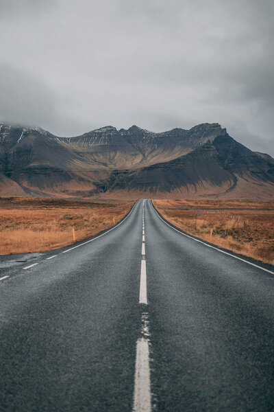Road leading to mountain range
