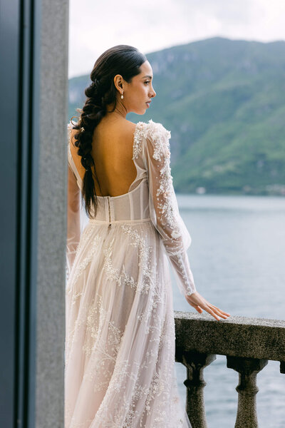 A wedding day bridal shot of a bride in her white dress at Villa Aura del Lago on lake como in Italy