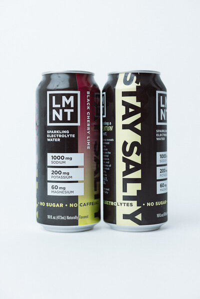 Two LMNT cans on a white backdrop as a part of a branding session for Physical Dimensions.