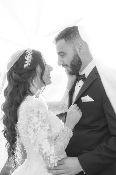 bride and groom looking at each other