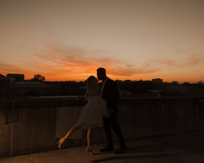 Elegant Couple in downtown charleston south carolina at sunset on a parking deck