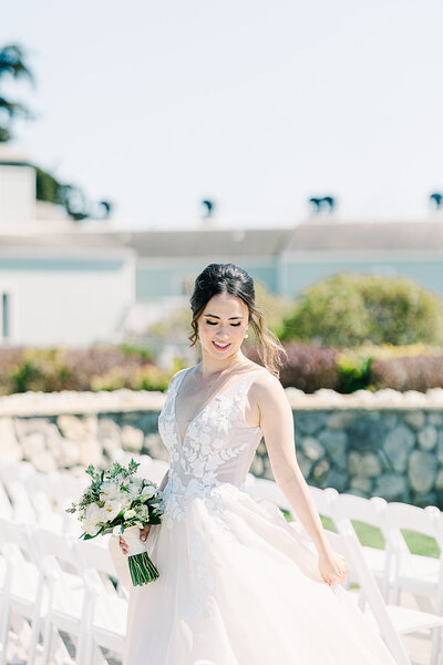 Bride and groom exchanging vows along the Half Moon Bay coast, with the Pacific Ocean and dramatic cliffs creating a breathtaking backdrop.