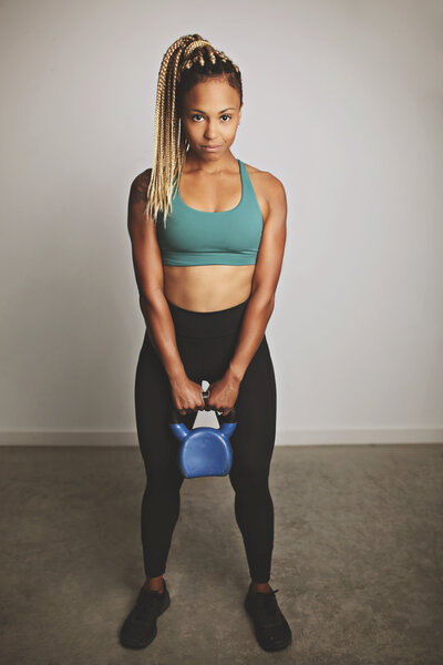 Trainer looking left to the middle distance