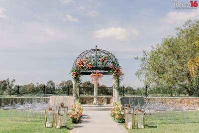 Outdoor wedding ceremony setup with gazebo at Old Ranch Country Club