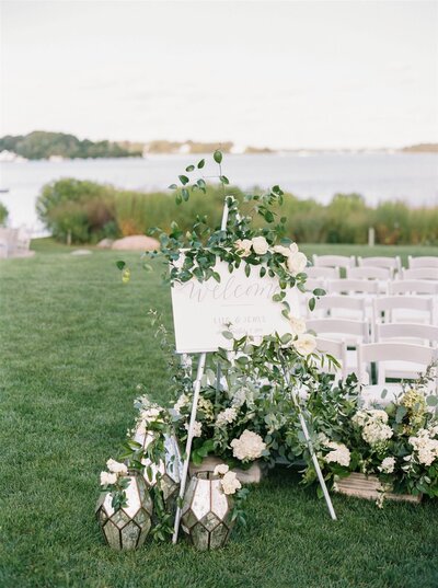 White and grey welcome sign for wedding at Weekapaug Inn in Rhode Island