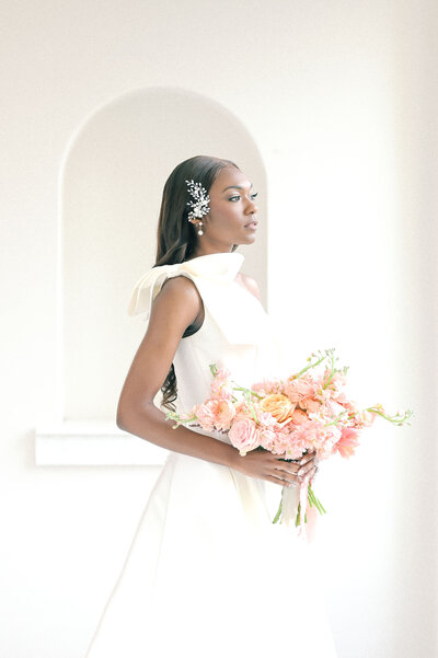 Fort Worth Wedding Photographer | DFW Photographer Rae De Lain Weddings Light and Airy | Bride holding pink floral bouquet