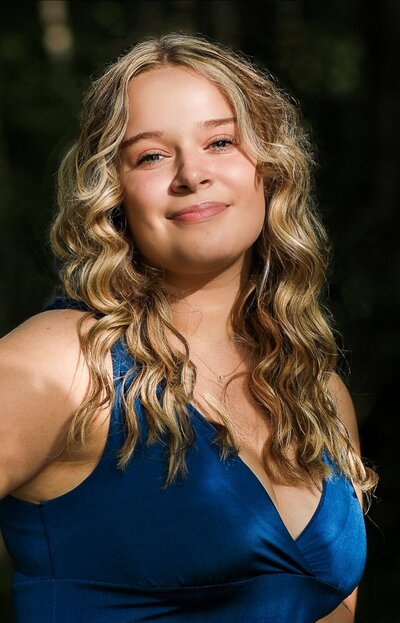 Photo of girl in blue dress at senior session