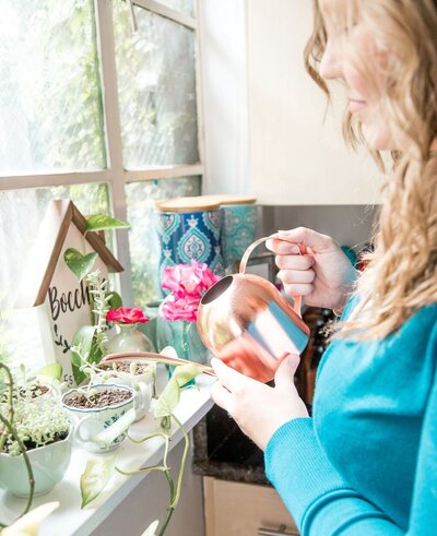 Julia Bocchese of Julia Renee Consulting watering plants